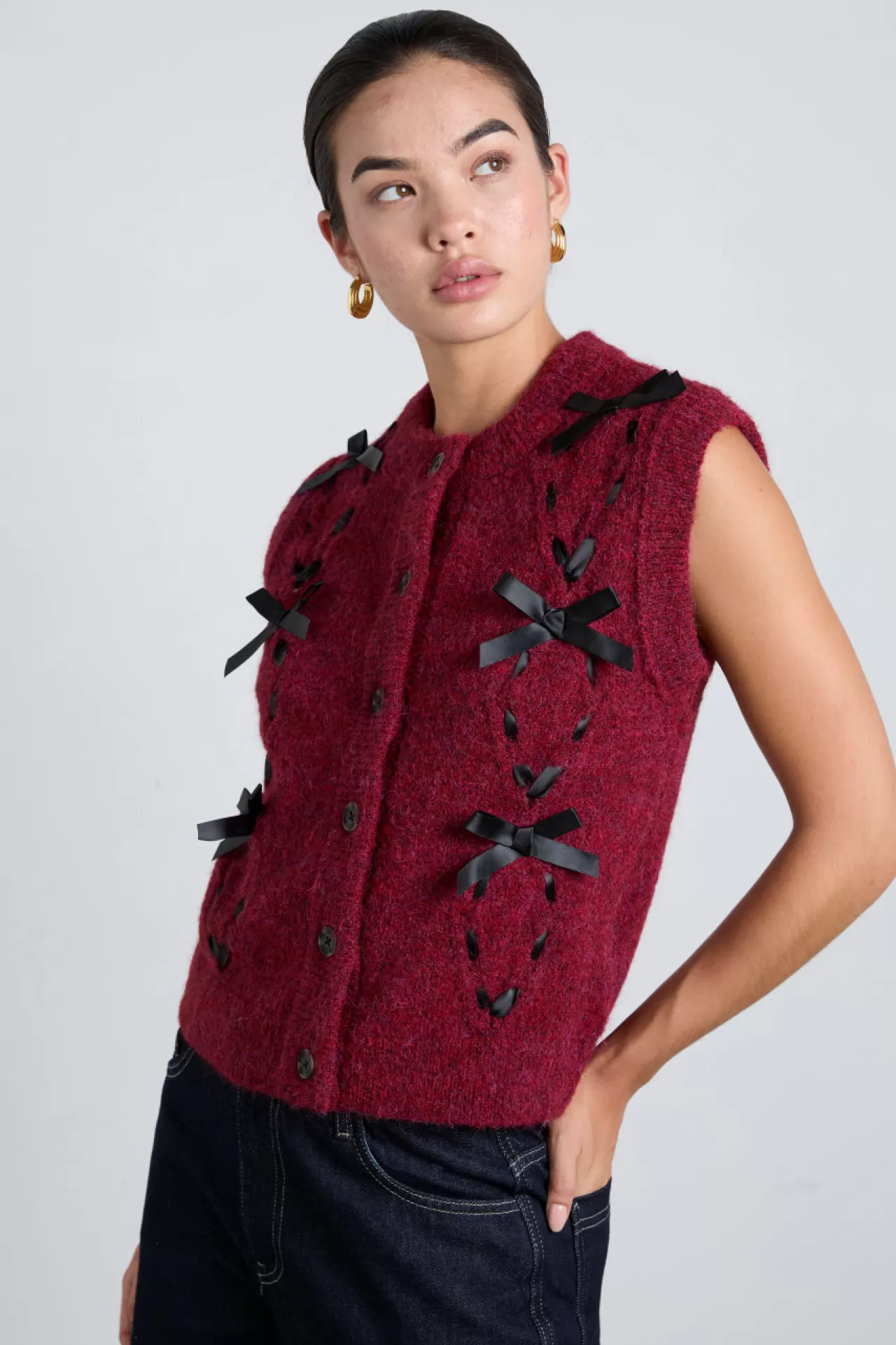 Store Damson Madder aggie knit vest with bows- cable burgundy