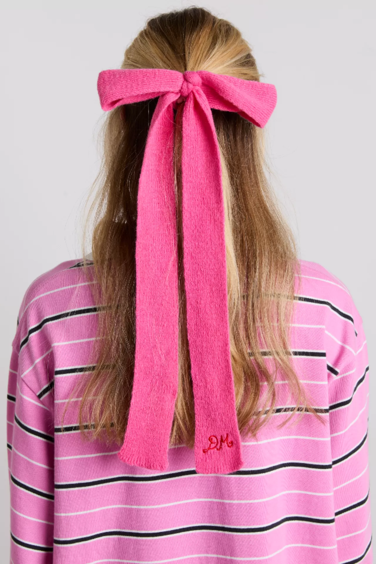 Store Damson Madder knitted hair bow in pink