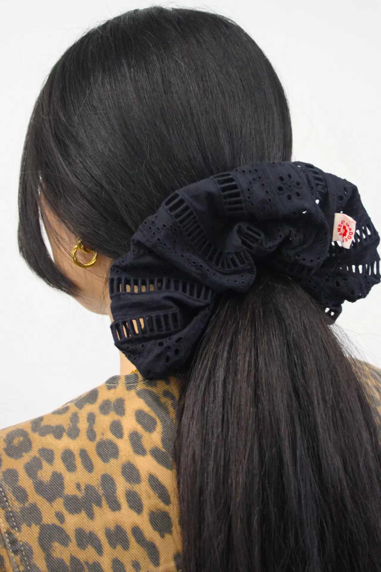 Shop Damson Madder oversized broderie scrunchie in black