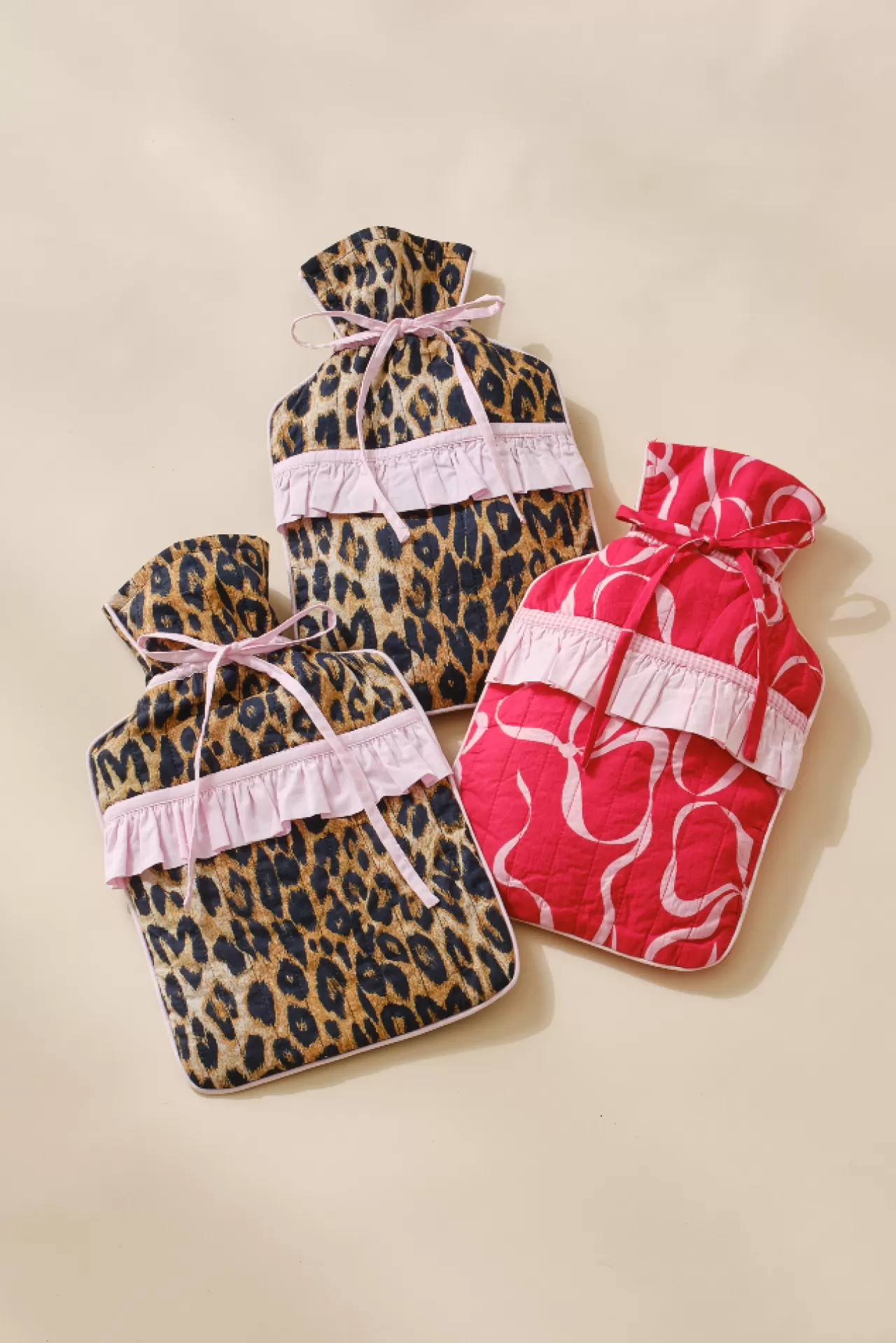 Hot Damson Madder quilted hot water bottle cover - print leopard