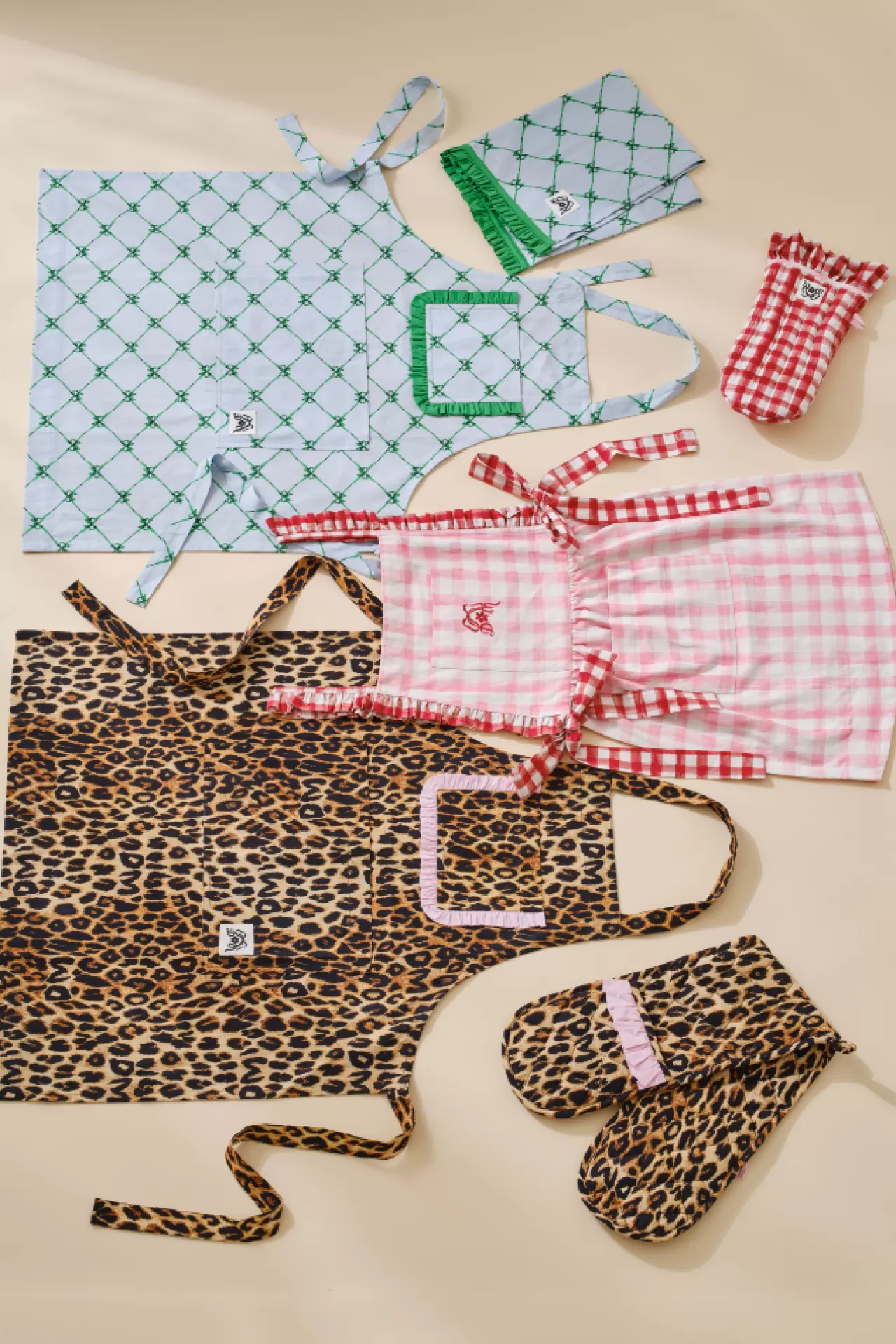 Shop Damson Madder valerie apron - pink ruffle leopard